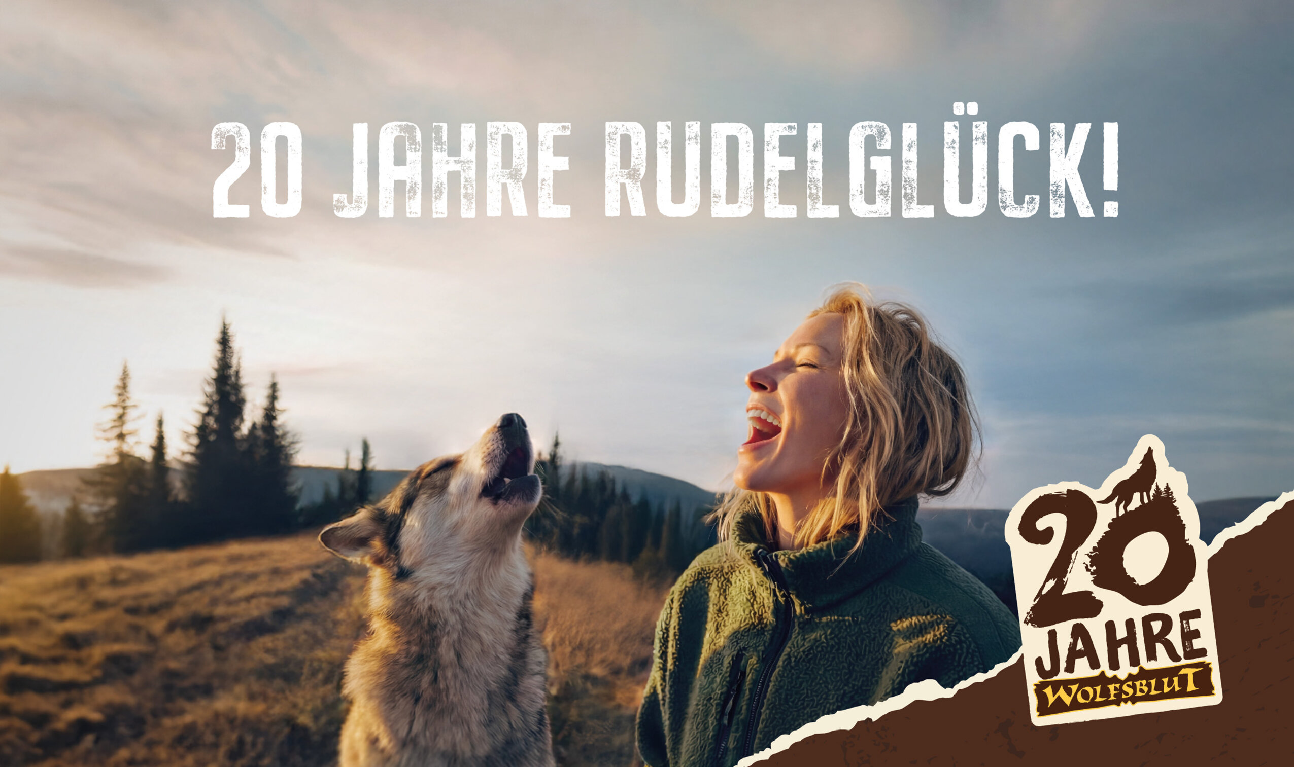 Das Keyvisual zeigt dasselbe Motiv von der Frau mit dem Hund, darüber steht die Headline „20 Jahre Rudelglück!", in der Ecke ist das Jubiläumslogo „20 Jahre Wolfsblut" zu sehen